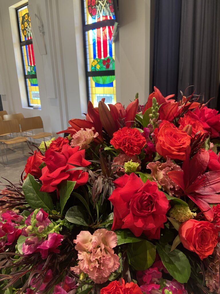 Red flowers in chapel